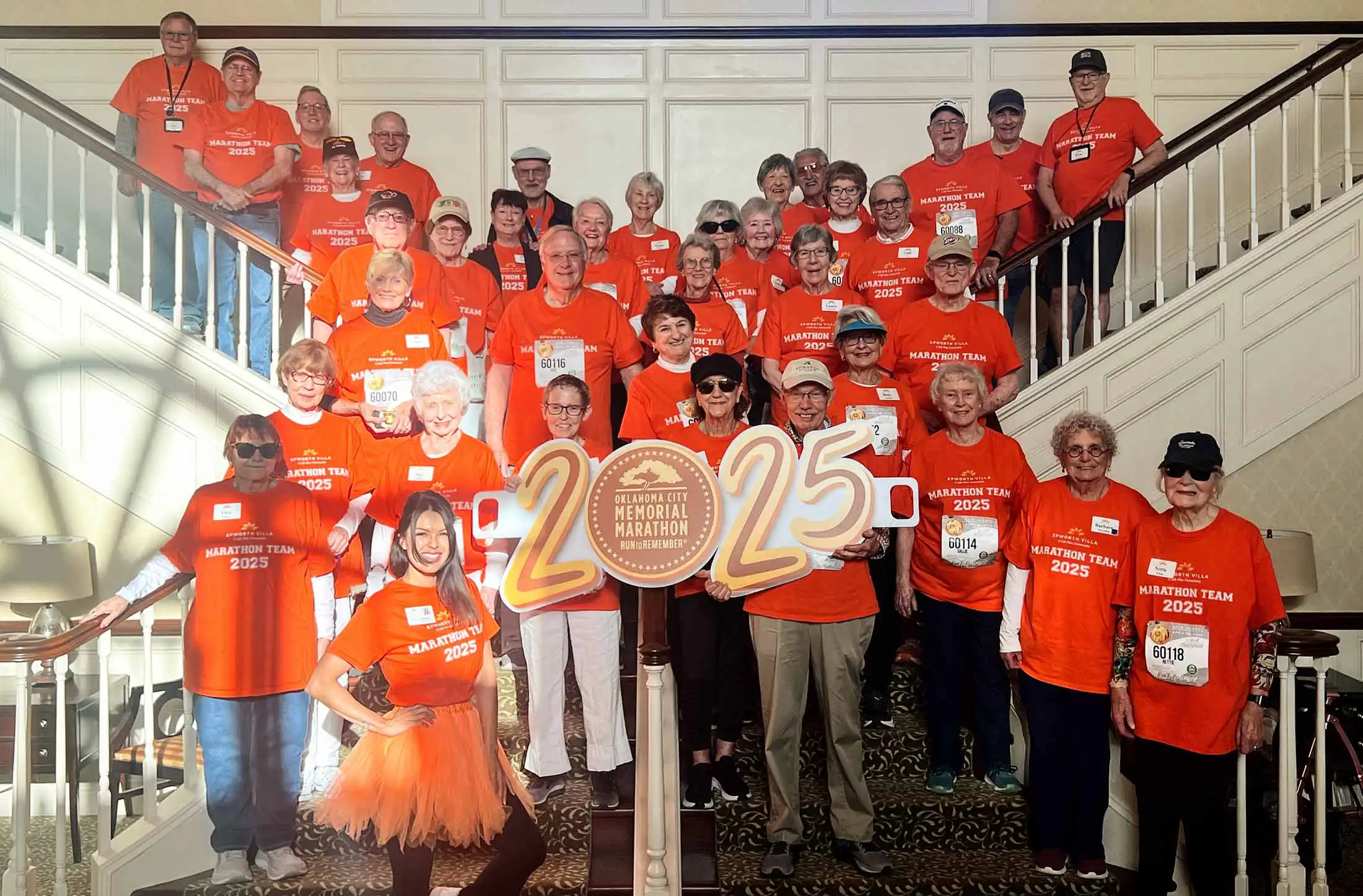 Group of marathon runners on the Epworth Villa steps