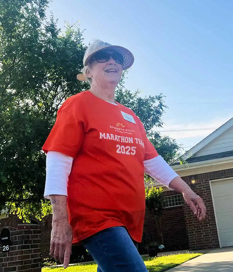 woman walking down the street for the marathon
