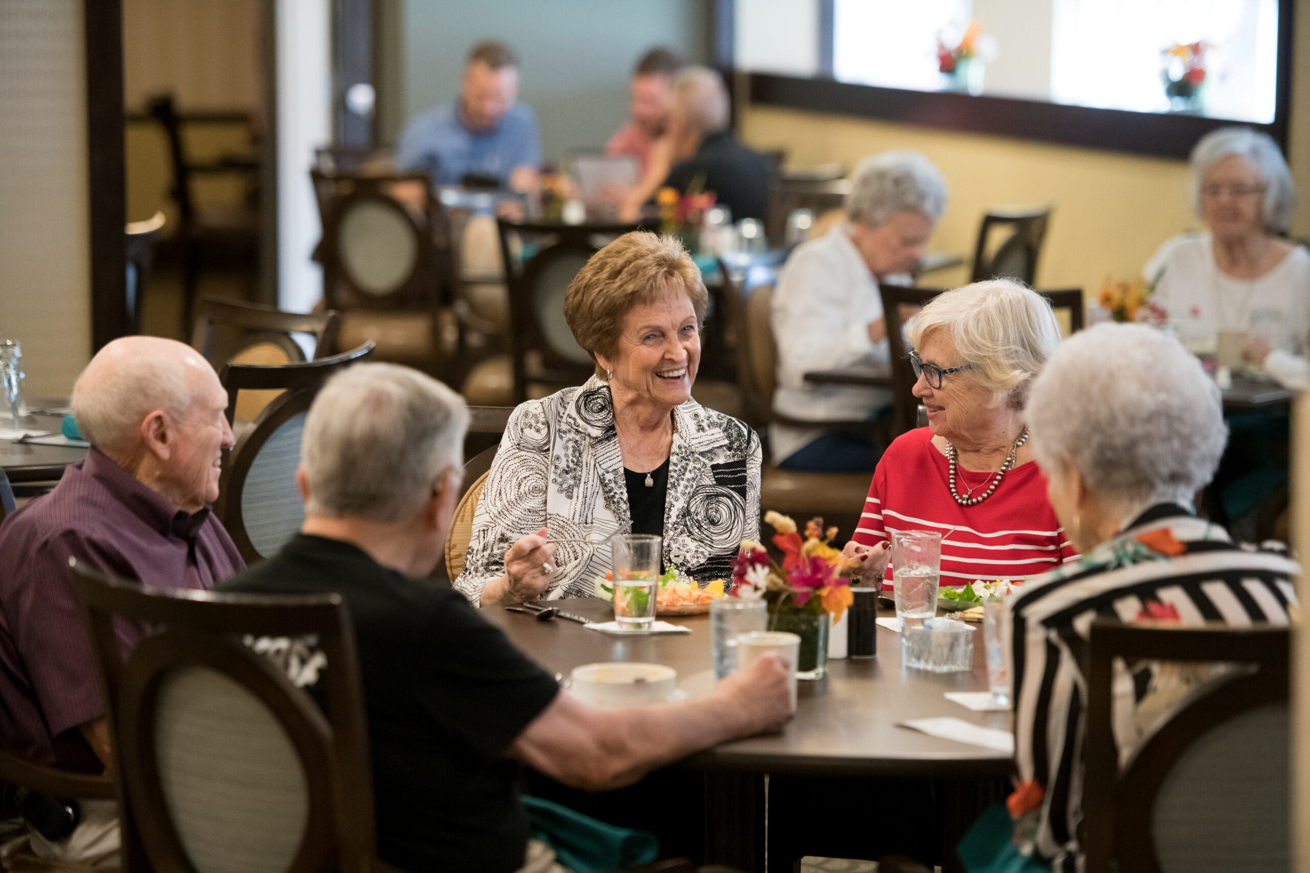 Seniors enjoying a meal together